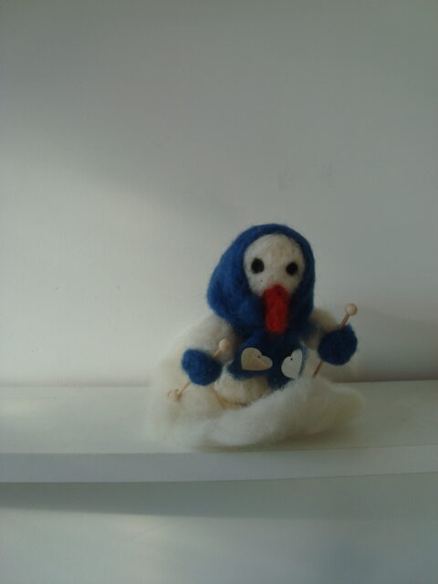 Sneeuwman op de ski donker blauw